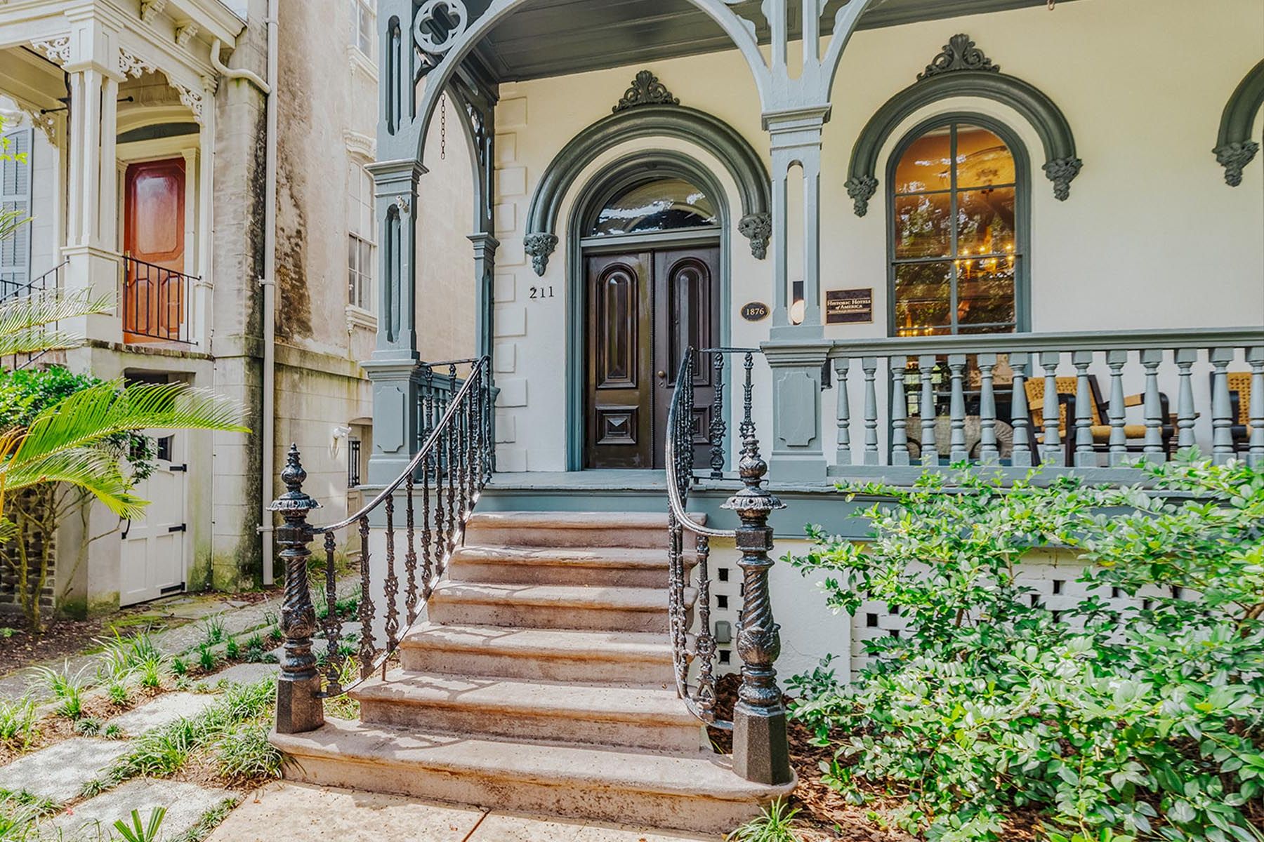 A historic house with a staircase and balcony