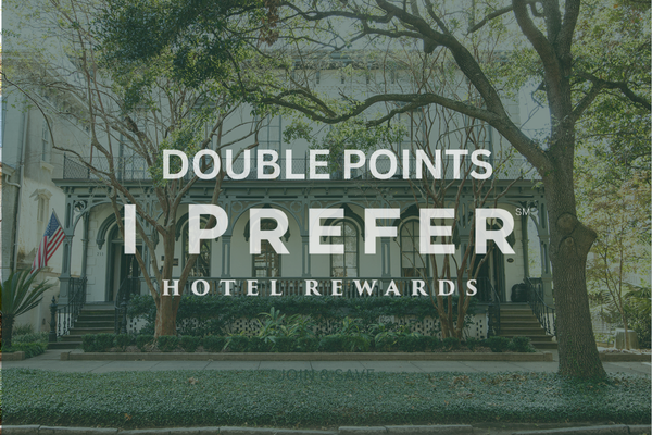 The image shows a house with trees, featuring "Double Points I Prefer Hotel Rewards" text for a promotional advertisement.