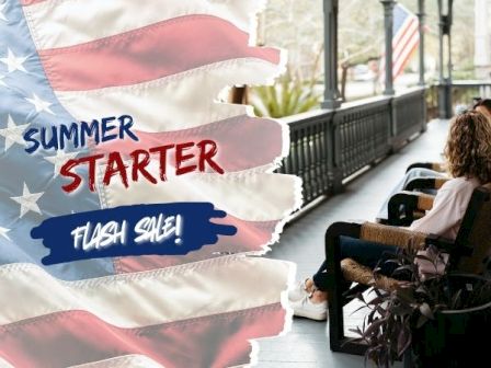A person in a wheelchair on a porch or cafe, with patriotic flags and a bold graphic reading &ldquo;Summer Starter&rdquo; and &ldquo;Fresh Sml&rdquo; (text partly cut off).