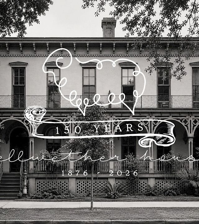 A black-and-white photo of a two-story house with a wraparound porch, trees framing the front, and a vintage car parked out front, with decorative text overlaid.